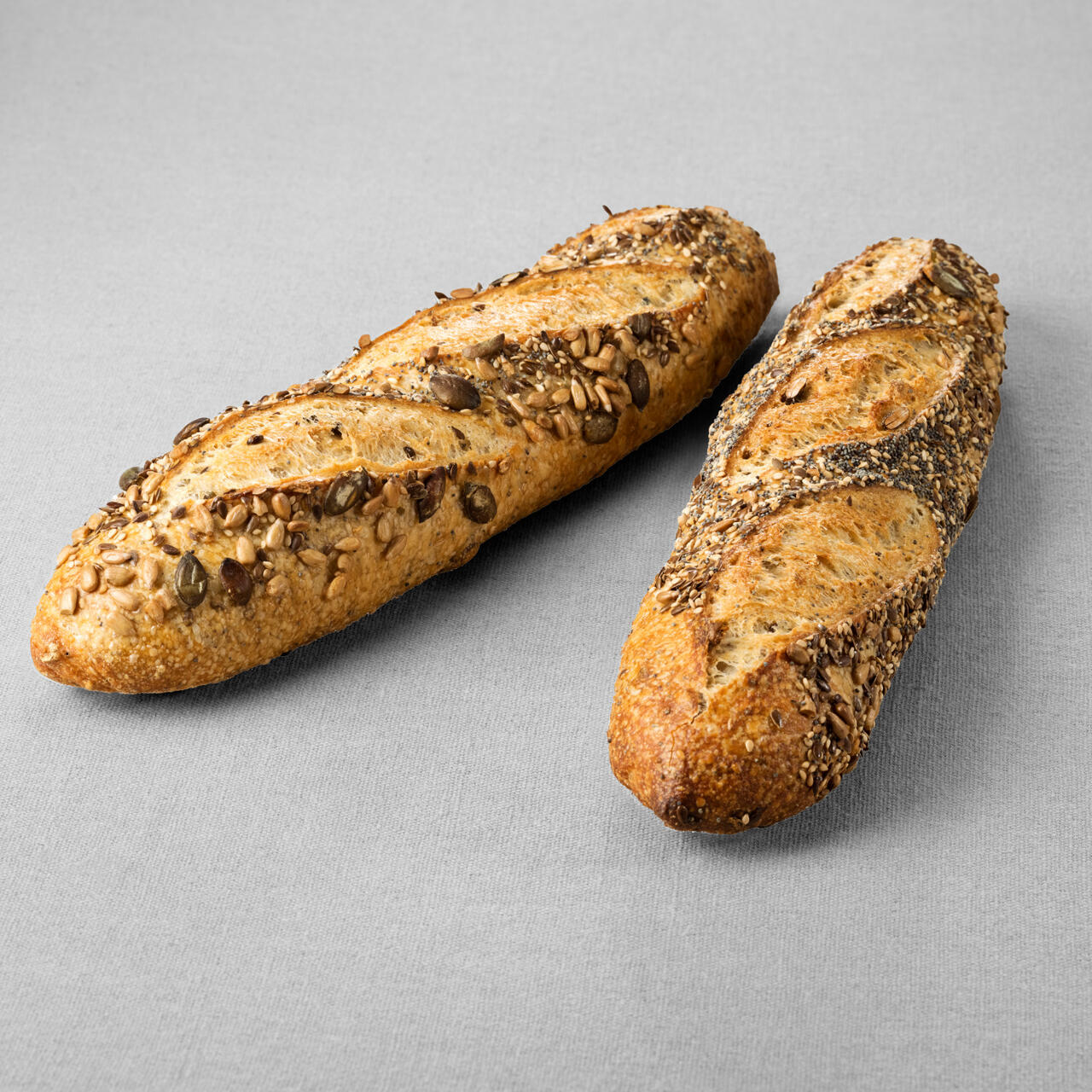 Pain type baguette issu d'une farine de blé blanche au pur levain naturel aux multigraines