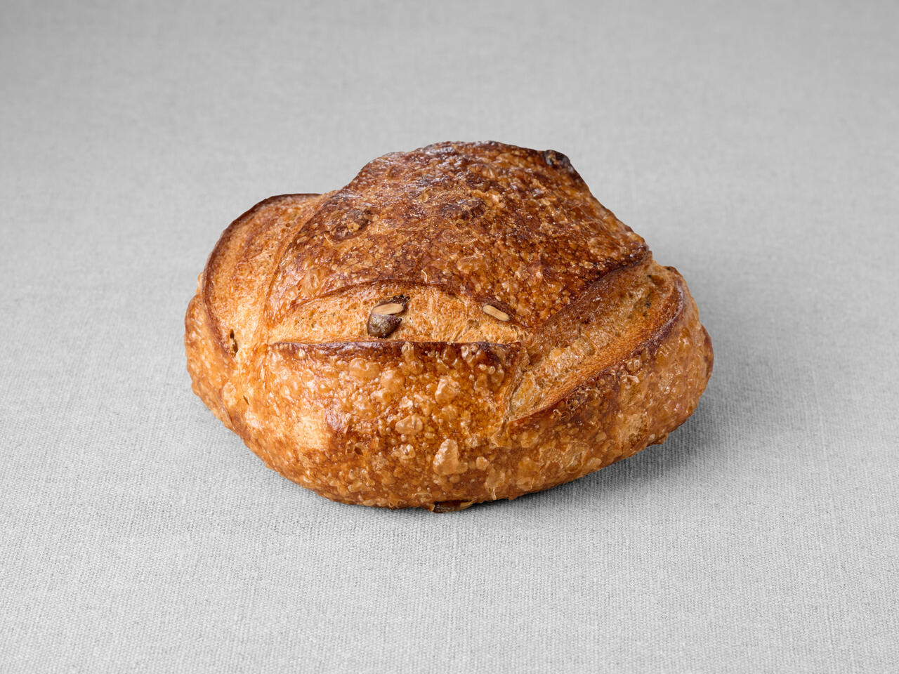 Petit pain issu d'une farine de blé blanche aux courges non moulé au pur levain naturel
