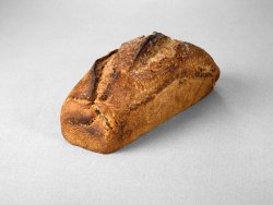 Pain moulé issu d'une farine de blé semi complète et d'une farine de seigle au pur levain naturel aux graines de tournesol