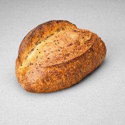 Grand pain issu d'une farine de blé blanche aux graines de lin non moulé au pur levain naturel